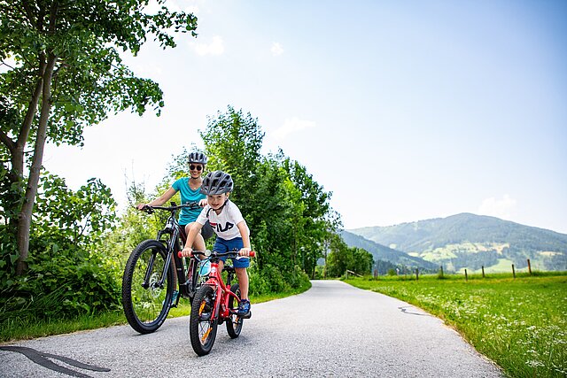 Cycle along the Enns cycle path - mom and child enjoy cycling away from the traffic